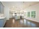 Modern kitchen with gray cabinets, an island, stainless steel appliances, and plenty of natural light at 119 Terrace View Dr, Acworth, GA 30101