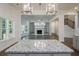 Kitchen island with granite countertop overlooking the living room with a fireplace at 119 Terrace View Dr, Acworth, GA 30101