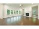 Spacious living room with hardwood floors, fireplace, and large windows at 119 Terrace View Dr, Acworth, GA 30101