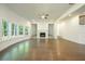 Living room with hardwood floors, fireplace, and ample natural light at 119 Terrace View Dr, Acworth, GA 30101