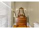 Charming bathroom with antique vanity and pedestal sink at 4924 Red Cliff Ct, Powder Springs, GA 30127