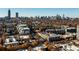 Aerial view of apartment building and surrounding neighborhood in autumn at 620 Glen Iris Ne Dr # 511, Atlanta, GA 30308