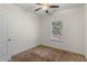 Bright bedroom with window and ceiling fan at 3462 Mount Zion Rd, Stockbridge, GA 30281