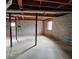 Unfinished basement with concrete floor and block walls at 5023 Vernon Oaks Dr, Atlanta, GA 30338