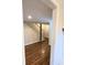 View of the finished basement with stairs and wood-look flooring at 5023 Vernon Oaks Dr, Atlanta, GA 30338