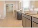 Main bathroom with double vanity and granite countertops at 311 Bianca Way, Mcdonough, GA 30253