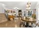 Bright living room with fireplace and dining area at 5156 Laurel Bridge Se Ct, Smyrna, GA 30082