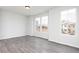 Bright living room with hardwood floors and large windows at 1421 Creekside Nw Cir, Atlanta, GA 30318