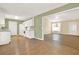 Open concept kitchen and dining area with wood floors at 14 Glenmore Dr, Kingston, GA 30145