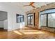 Sun-filled living room with exposed brick and hardwood floors at 142 Walker Sw St, Atlanta, GA 30313