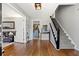 Bright entryway with hardwood floors, staircase, and views into adjacent rooms at 290 Vistawood Dr, Marietta, GA 30066