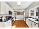 Modern kitchen with stainless steel appliances and white cabinets at 605 Moreland Se Ave, Atlanta, GA 30316