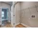 Laundry room with washer/dryer hookups and built-in shelving at 4230 Moore Rd, Conley, GA 30288