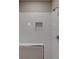 White subway tile shower with a decorative inset at 4230 Moore Rd, Conley, GA 30288