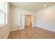 Home office with french doors, hardwood floors, and neutral walls at 138 Henley St, Canton, GA 30114