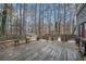 Wooden back deck surrounded by trees at 2291 Wilkins Ct, Decatur, GA 30035