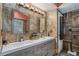 Bathroom with double vanity, tiled walls, and modern fixtures at 2291 Wilkins Ct, Decatur, GA 30035
