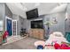 Bedroom with two beds, a dresser, and wall-mounted TVs at 2291 Wilkins Ct, Decatur, GA 30035