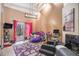 Living area with a fireplace, TV, exercise equipment, and ' toys at 2291 Wilkins Ct, Decatur, GA 30035