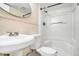 Simple bathroom with white fixtures, a shower/tub combo, and pedestal sink at 1767 Big Horn Se Ct, Conyers, GA 30013