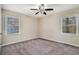 Spacious bedroom with plush carpeting and ample natural light at 1767 Big Horn Se Ct, Conyers, GA 30013