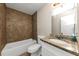 Bathroom with granite countertop and tile shower at 1299 Paddocks Way, Powder Springs, GA 30127