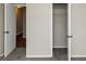 Bedroom with two closets and grey carpet at 1299 Paddocks Way, Powder Springs, GA 30127