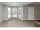 Bright dining area with tile floors and bay window at 1299 Paddocks Way, Powder Springs, GA 30127