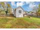 House exterior showcasing a deck and stairs leading to the backyard at 1299 Paddocks Way, Powder Springs, GA 30127