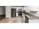 Kitchen with granite countertops and stainless steel appliances at 1299 Paddocks Way, Powder Springs, GA 30127