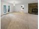 Spacious living room with neutral carpeting and lots of natural light at 120 Black Rock Ct, Fayetteville, GA 30214