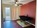 Dining area with wood-look floors, sliding glass door, ceiling fan, and a table at 2711 Greystone Ct, Austell, GA 30106