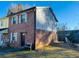 Charming two-story home with brick and siding exterior, front yard, and walkway at 2711 Greystone Ct, Austell, GA 30106