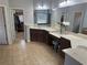 Luxurious Primary bathroom featuring double vanity, walk-in closet, and tiled floors at 1880 Hays Farm Walk, Marietta, GA 30064
