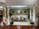 Elegant dining room with tray ceiling, chandelier, and large windows at 1880 Hays Farm Walk, Marietta, GA 30064