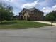 View of a two-story brick home with an attached garage at 1880 Hays Farm Walk, Marietta, GA 30064