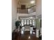 View from the foyer into a two-story living room with a balcony at 1880 Hays Farm Walk, Marietta, GA 30064