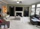 Spacious living room with fireplace, ample seating, and natural light at 1880 Hays Farm Walk, Marietta, GA 30064
