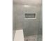 Spacious tiled shower with built-in bench and recessed shelf at 1880 Hays Farm Walk, Marietta, GA 30064
