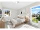 Spacious bedroom with large windows and neutral decor at 6550 Ashdale Dr, South Fulton, GA 30349