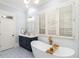 Bathroom with walk-in shower and free-standing bathtub at 195 Worth Dr, Atlanta, GA 30327