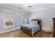 Cozy bedroom with hardwood floors and window seating at 195 Worth Dr, Atlanta, GA 30327