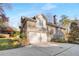 Two-car garage with brick exterior and a spacious driveway at 195 Worth Dr, Atlanta, GA 30327
