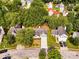 An aerial view of a home in a quiet neighborhood with lush green lawns at 2921 Ward Lake Way, Ellenwood, GA 30294