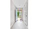 Bright entryway with light blue door open to the neighborhood at 2921 Ward Lake Way, Ellenwood, GA 30294