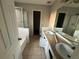 Bathroom with double vanity and shower at 5830 Burdett Ridge, Atlanta, GA 30349