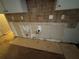 Kitchen with tile backsplash and new countertops at 5830 Burdett Ridge, Atlanta, GA 30349