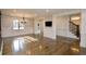 Dining room with hardwood floors, chandelier lighting, and a staircase at 1985 Mount Vernon Pl, Atlanta, GA 30338