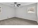 Bedroom with window, ceiling fan and closet at 630 El Prado Ct, Stone Mountain, GA 30083