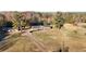 Aerial view of house and property showing driveway and trees at 1824 Smith Store Rd, Covington, GA 30016